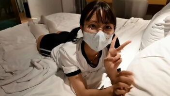 Xnxx video of a pretty Chinese girl with beautiful legs in white stockings.